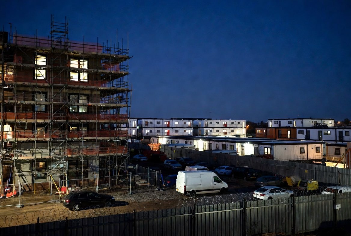 Construction site scaffolding at night
